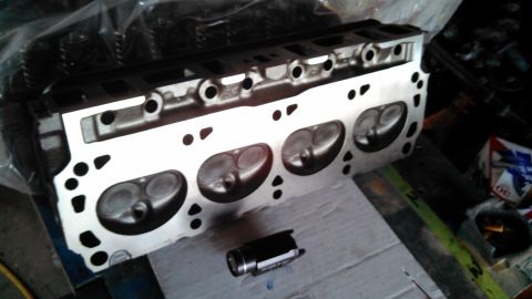 1977 Ford F-150 - A close-up view of an engine cylinder head, showing its internal valve structure and port structure.
