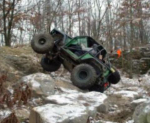 1992 Ford Bronco - about to go over! taken a split second beofre right front, and left rear tires lifted