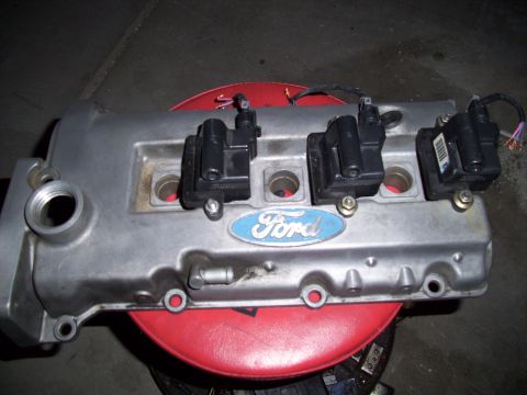 1995 Ford Probe - Ford valve cover with ignition coils removed from engine.