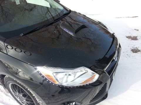 2012 Ford Focus - This car has a hood scoop and LED accent lights around the headlight.