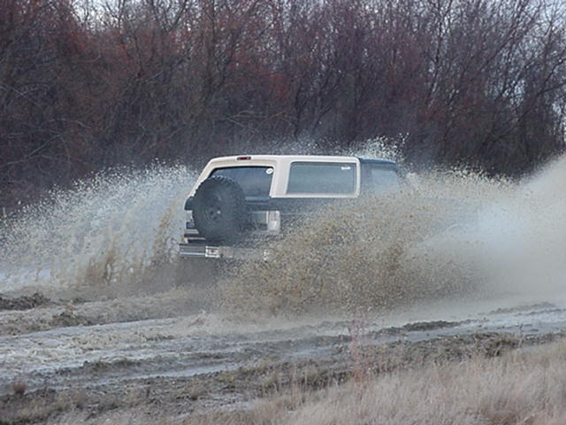 side shot of puddle crossing