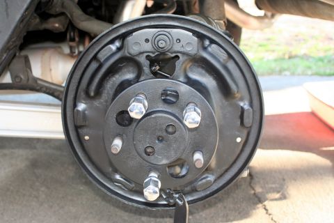 1976 Ford Ranchero - Close-up of a rear drum brake assembly, showing internal components.