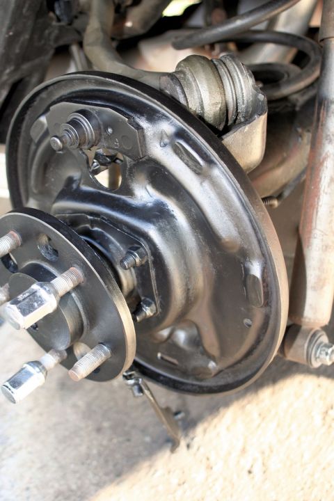 1976 Ford Ranchero - This photo shows a close-up view of a vehicle's rear drum brake assembly, including the brake shoes and backing plate.