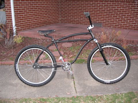 1994 Ford Bronco - Custom cruiser bicycle with wide tires and a unique frame design.