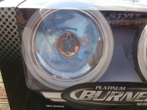 2004 Dodge 1500 - Optronics Platinum Burners Driving Lights for the behind the grille light modification.