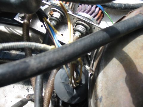 1992 Ford Bronco - Close-up view of engine bay components, including hoses and wiring.