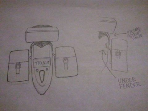 1995 Ford F-150 - Hand-drawn sketch of bracket mounting concepts labeled TRKNUT and factory strut holes under the fender.