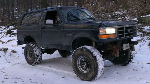 1995 Ford Bronco - This 1995 Ford Bronco is equipped with large tires for off-road use in snowy conditions.