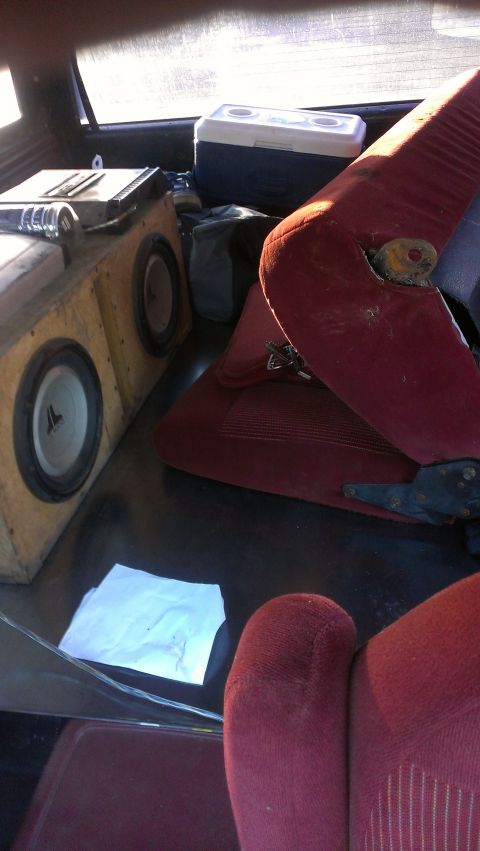 1995 Ford Bronco - Aftermarket speakers and a cooler are visible in the back of this vehicle's interior.