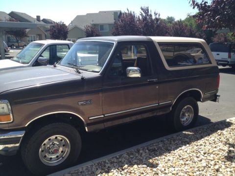 1992 Ford Bronco - This 1992 Ford Bronco is seen from the side, a two-tone brown and tan paint scheme.