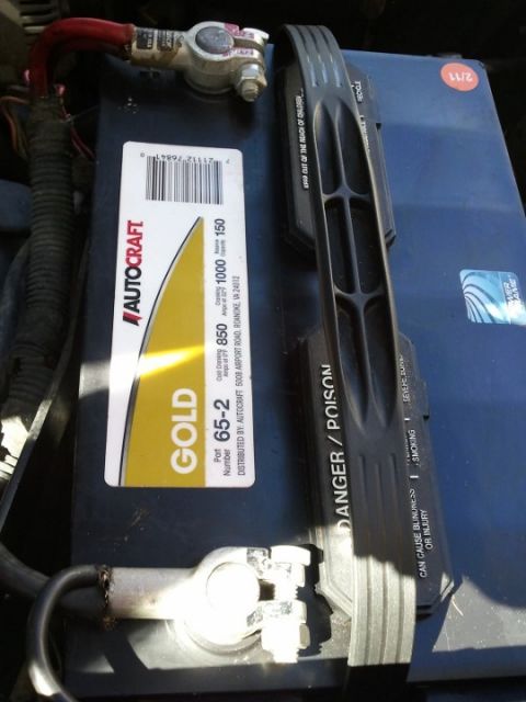 1994 Ford Bronco - Autocraft Gold battery, part number 65-2, shows cold cranking amps and capacity ratings.