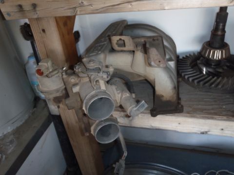 1978 Ford Bronco - This assembly includes a throttle body and intake manifold, likely for an older vehicle.