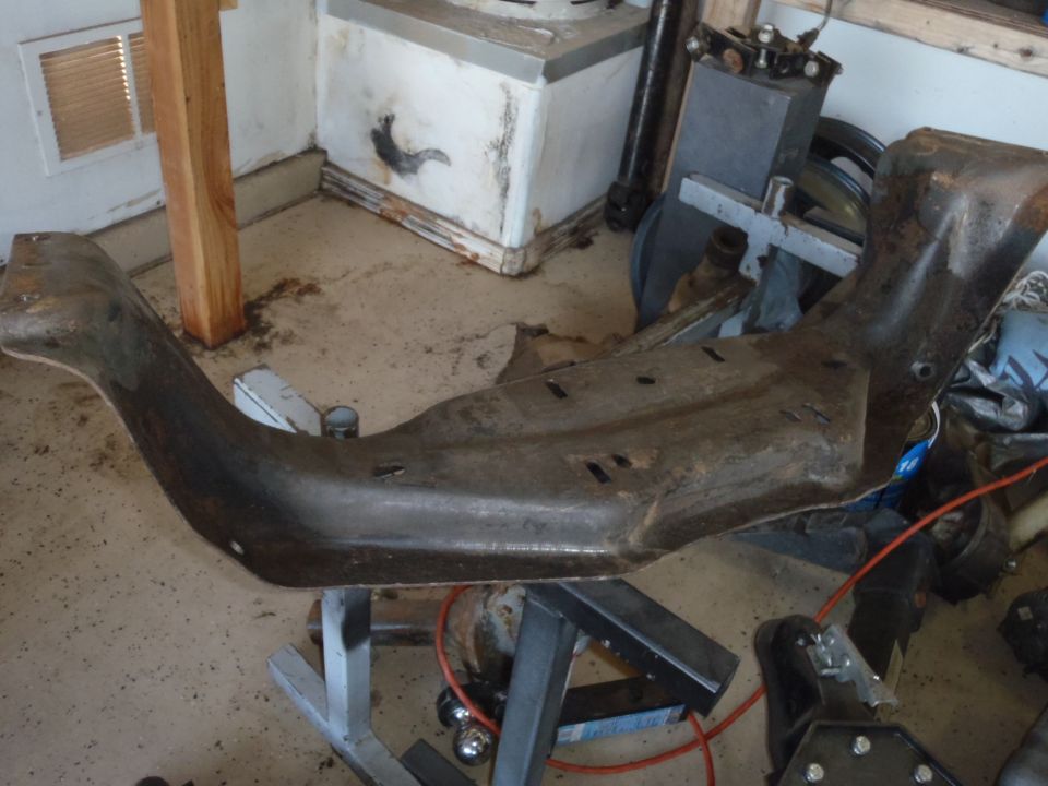 rusted metal frame part on stand