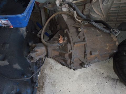 1978 Ford Bronco - A transmission part is shown with a hose and a fallen leaf. The registry claims it is from a 1978 Ford Bronco, but this cannot be confirmed…