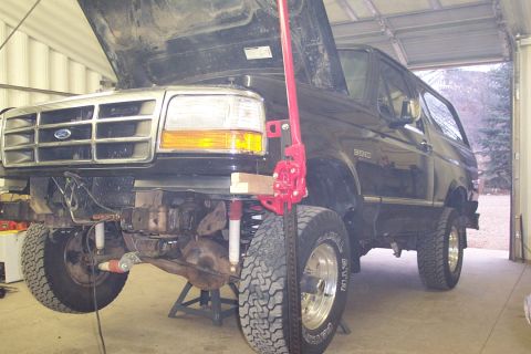 1996 Ford Bronco - We used a high lift jack to support the front of the body while we plasma'ed off the body mounts.