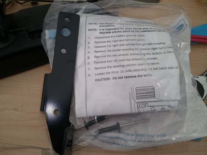 Numbered service instruction sheet for instrument panel removal with a figure, in a parts bag