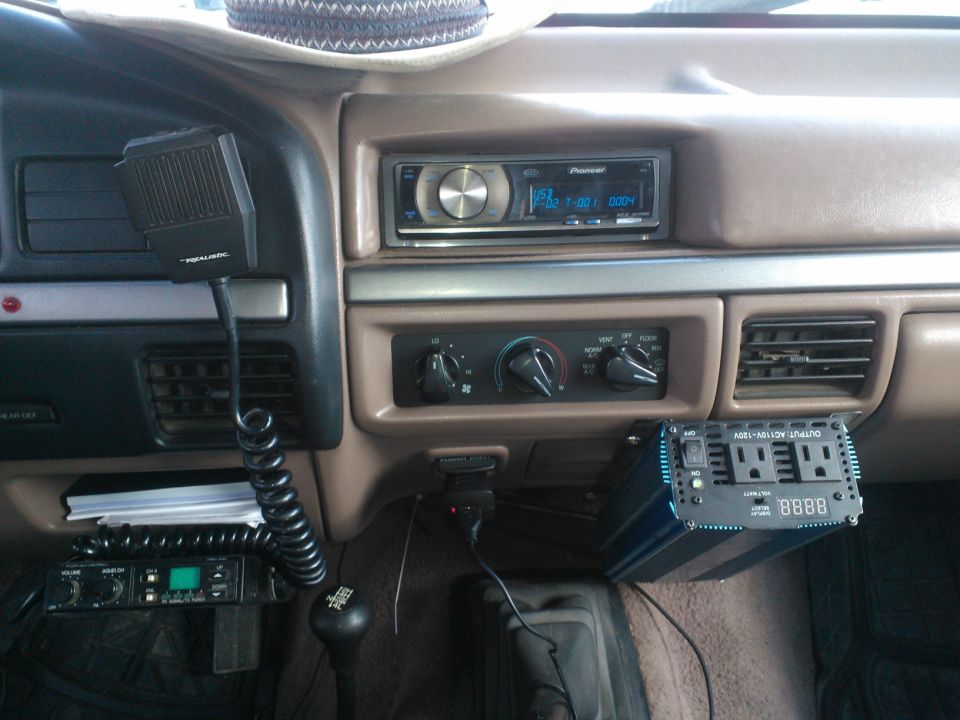 1992 Ford Bronco interior showing CB radio, Pioneer stereo, and power inverter