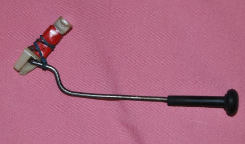 1983 Volkswagen Rabbit - Door latch mechanism with red tape and rubber bands on the actuator.