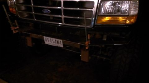 1995 Ford Bronco - Front view of a 1995 Ford Bronco, showing the bumper and license plate.