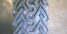 1992 Ford Bronco - The intricate tread pattern of a tire is shown in detail.