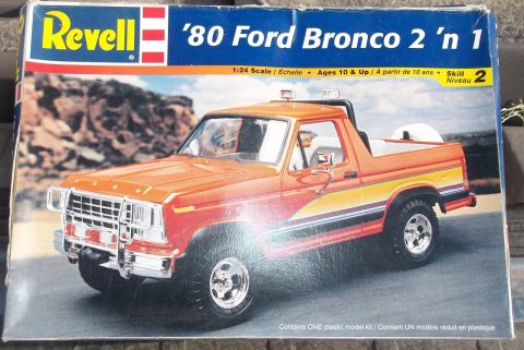 1992 Ford Bronco - Box art for a 1980 Ford Bronco model kit, showing an orange Bronco with racing stripes.