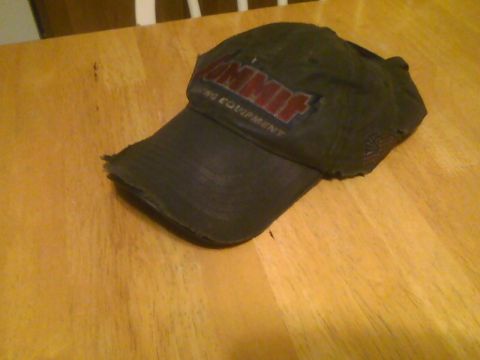 2003 Ford Crown Victoria - A baseball cap with a Summit Racing Equipment logo is displayed on a wooden surface.