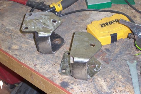 1996 Ford Bronco - Front most spring hangers. Keith modified them a bit, and I cleaned them up with the grinder.