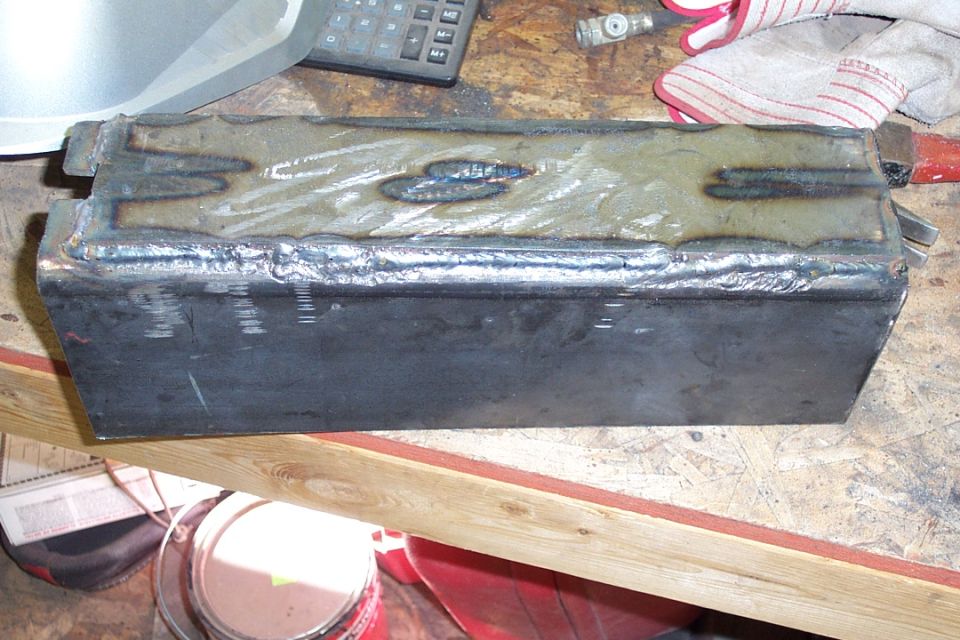 The clean weld beads are Keith's. The ugly boogered up weld beads are mine.
This was the first time in 13 years that I have used a welder so as you can tell I need more practice.