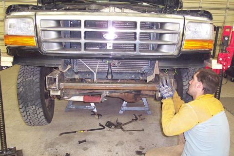 1996 Ford Bronco - Keith test fitting it. We had the fun of test fitting about 4 times over the weekend. Believe me Keith and I cussed at it everytime.