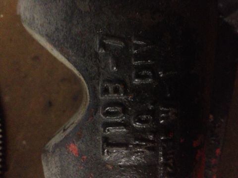 1972 Ford F-100 - A dark metal component displays stamped identification numbers, with '10B' and '416' partially visible.