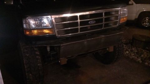 1995 Ford Bronco - Front view of a 1995 Ford Bronco showing the grille and a custom bumper.