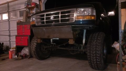 1995 Ford Bronco - Custom bumper installed on a 1995 Ford Bronco in a garage setting.