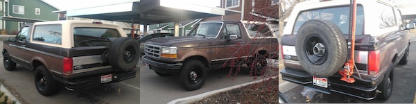 Brown 1992 Ford Bronco with a tan top and a spare tire mounted on the rear