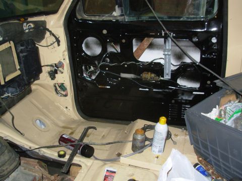 1983 Ford Bronco - The driver's door harness runs inside the passenger lower A-pillar where it connects to the passenger door harness.