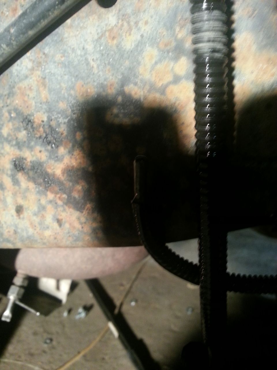 Rusted frame and ribbed belt