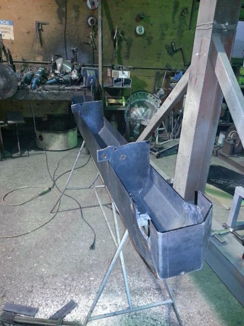 1994 Ford Bronco - Custom metal fabrication project in progress within a workshop setting.