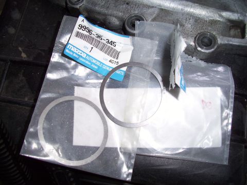 1995 Ford Probe - Mazda automobile genuine parts, including gaskets, are shown in this close-up.