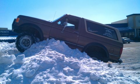 1987 Ford Bronco - This 1987 Ford Bronco navigates a challenging snow drift.