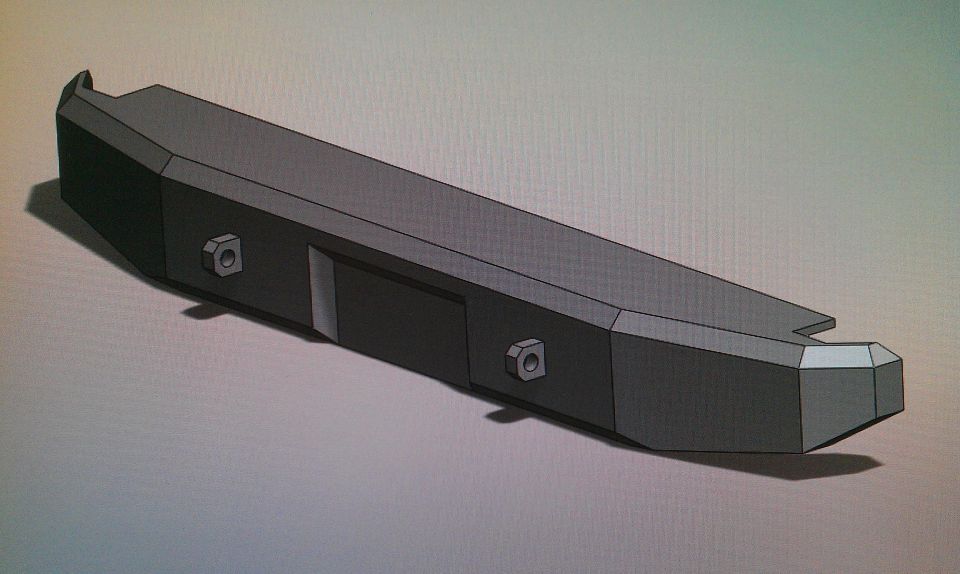 Gray aftermarket bumper section with two bolt holes visible