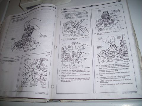 1995 Ford Probe - Transmission assembly diagrams from a repair manual, dated August 1994.