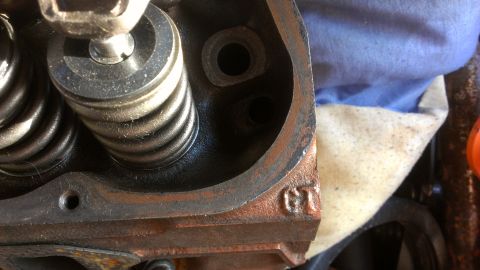 1990 Ford Bronco - Engine cylinder head shows valve springs and a GT marking, not a 1990 Ford Bronco.