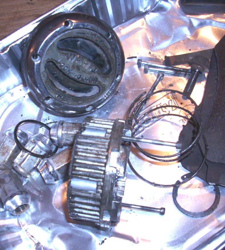 Warn locking hubs disassembled with springs and bolts on a foil surface