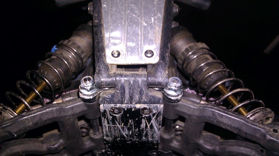 RC car front suspension with shocks and control arms