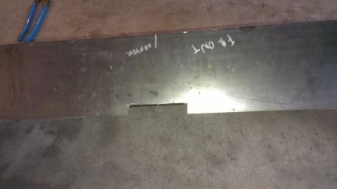 1995 Ford Bronco - A metal panel is marked with 'FRONT' and 'CENTER' in white chalk.