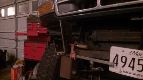 1995 Ford Bronco - The front bumper of a 1992 Ford Bronco is visible, with a license plate attached.