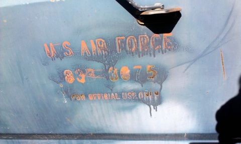 1994 Ford Bronco - Markings on a vehicle window indicate "US Air Force" and "833-3075" for official use only.