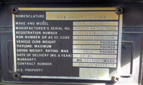 1994 Ford Bronco - Vehicle identification plate details including make, model, serial number, and weight ratings.