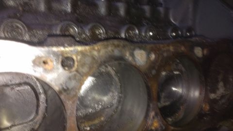 1990 Ford Bronco - This image shows the internal cylinders of an engine block, indicating wear and potential damage.
