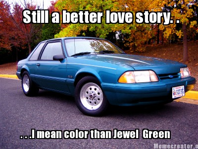 1993 Ford Taurus - This teal 1993 Ford Mustang coupe is shown parked on a road during autumn.