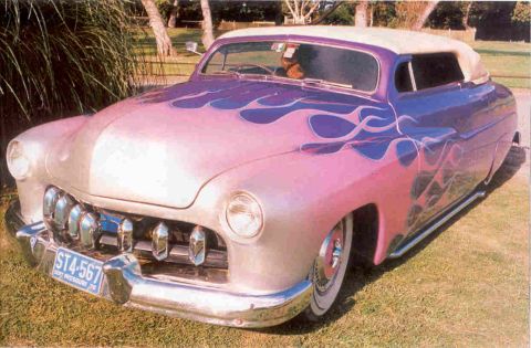 1969 Lincoln Continental - This 1950 Mercury Eight has a custom flame paint job and a lowered suspension.
